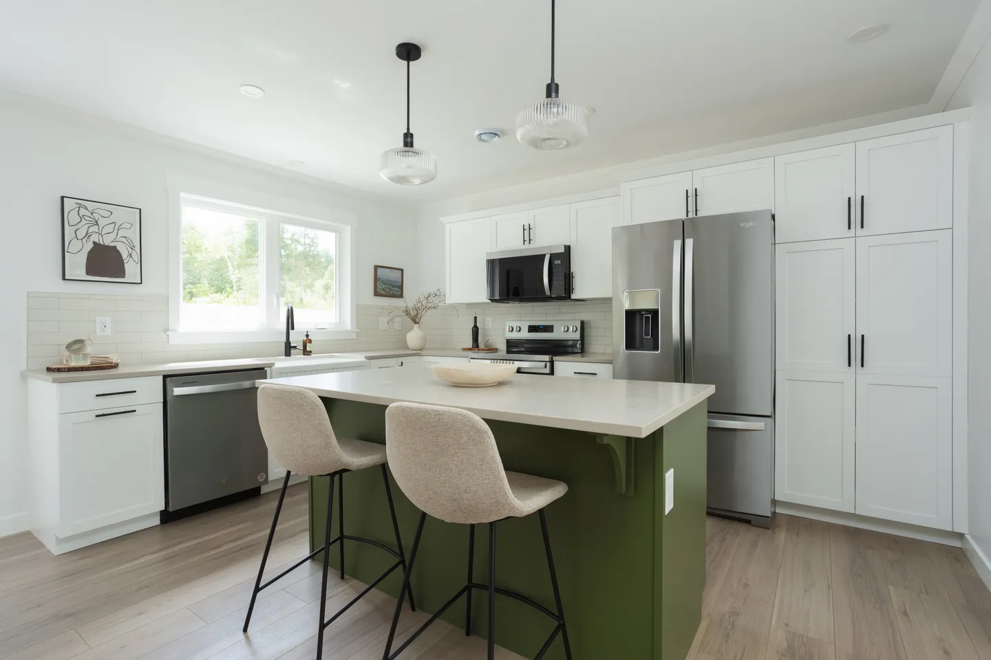 kent-homes-modern-kitchen-green-island-white-cabinets.jpg