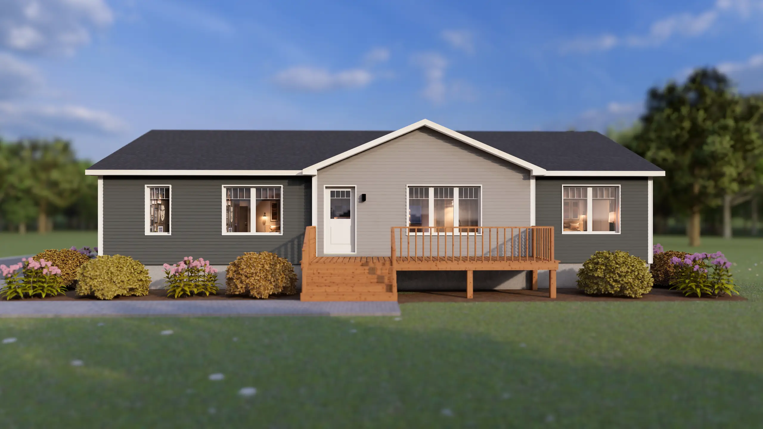 Modern bungalow featuring a spacious front deck, large windows, dark exterior siding, and well-maintained landscaping with shrubs and blooming flowers. 