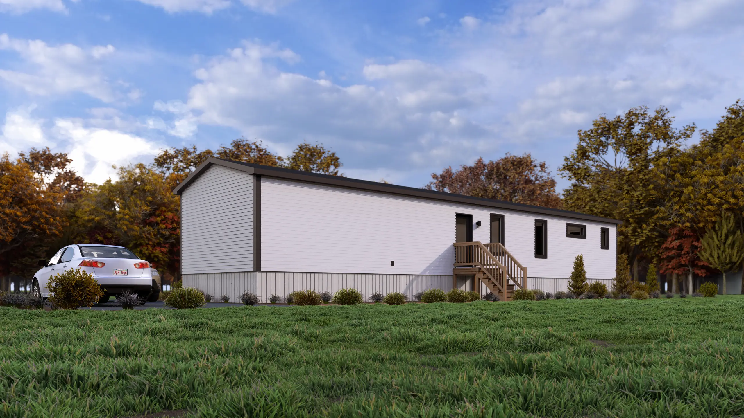 Long side elevation of a mini home featuring a secondary entrance with wooden stairs, narrow accent windows, and landscaped foundation plantings. 