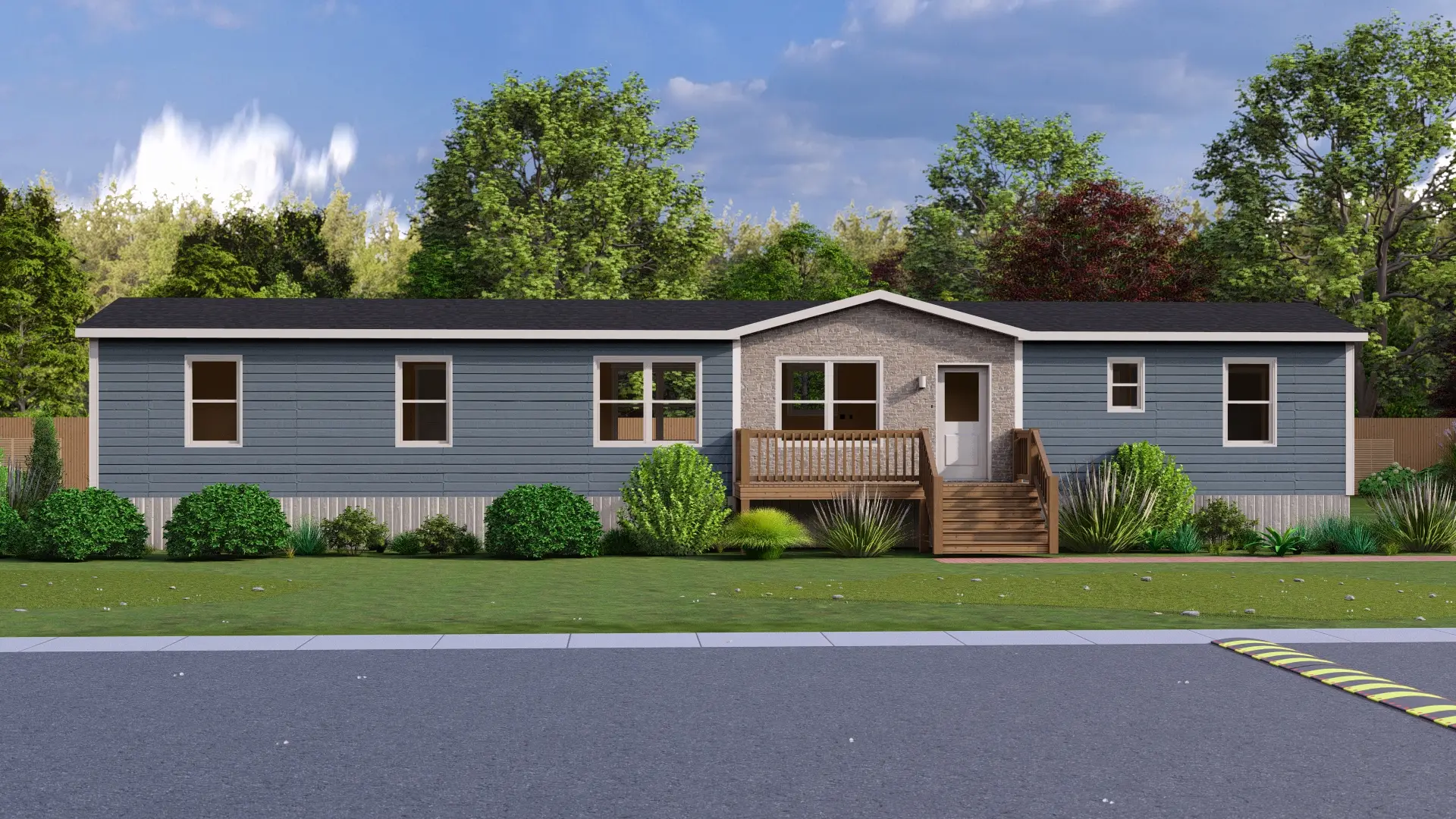 Front elevation of a contemporary mini home featuring blue siding, a stone-look central façade, raised entry deck, and landscaped foundation plantings. 