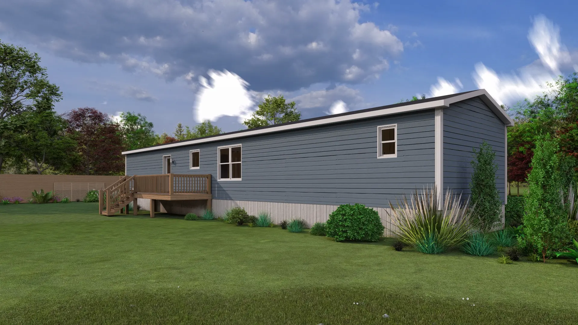 Side view of a contemporary mini home featuring blue horizontal siding, rear deck access, white trim, and landscaped gardens. 