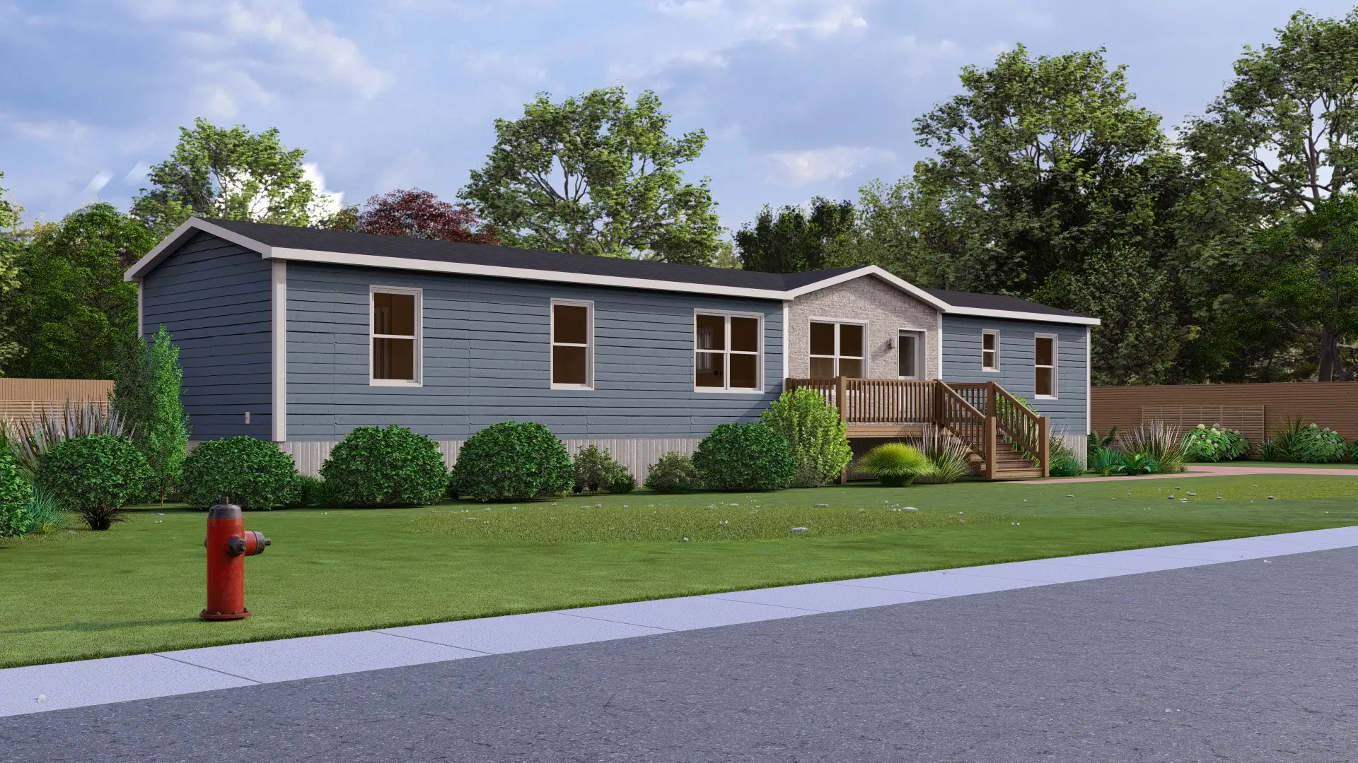 Front corner view of a contemporary mini home showcasing a stone-look central entrance, blue siding, wood entry stairs, and landscaped shrubs. 