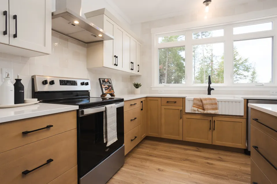 kent-homes-nb-cottage-kitchen-white-cabinets-wood.jpg