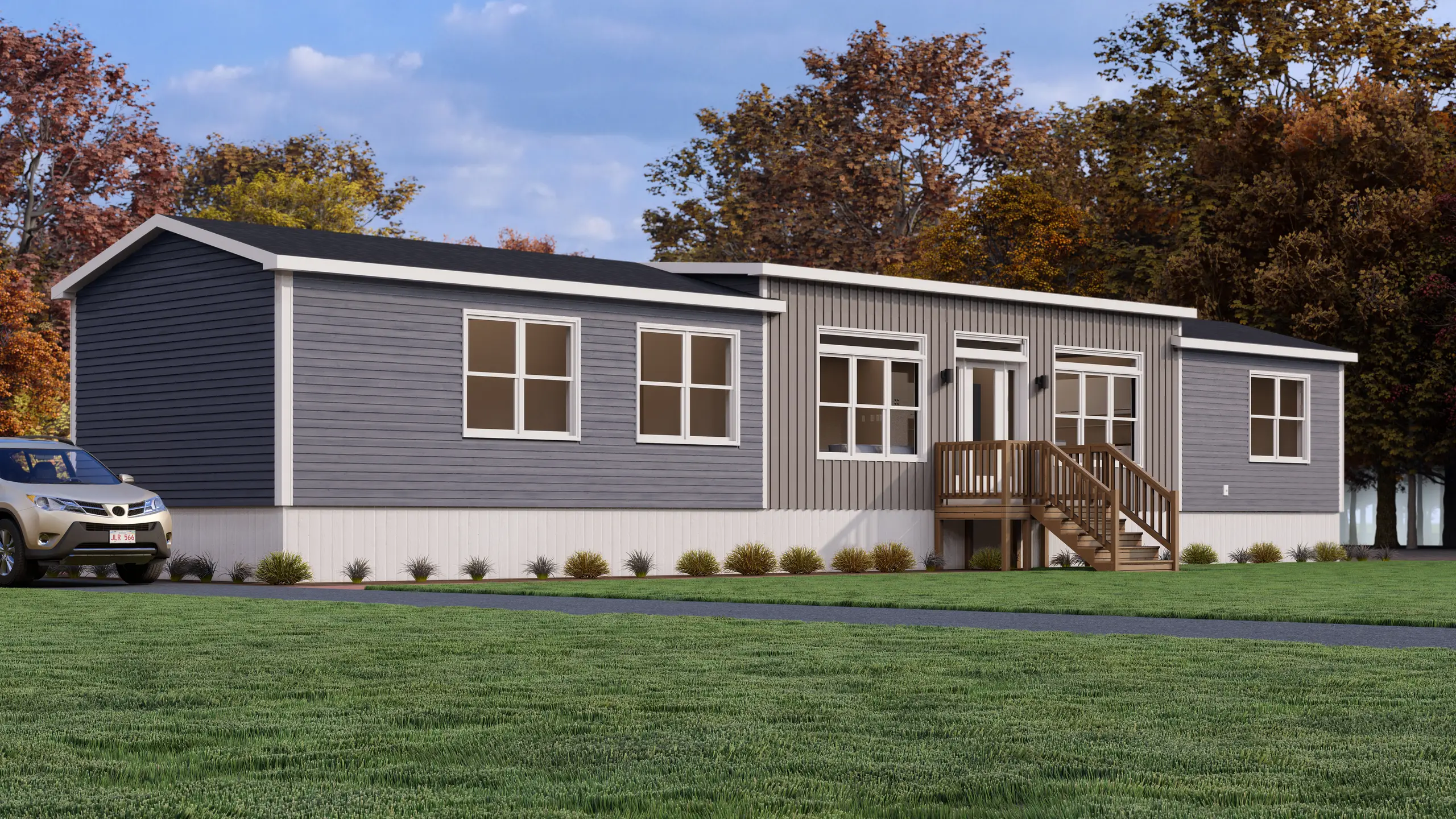 Contemporary mini home featuring a central covered entry, oversized windows, contrasting vertical and horizontal siding, and landscaped surroundings. 