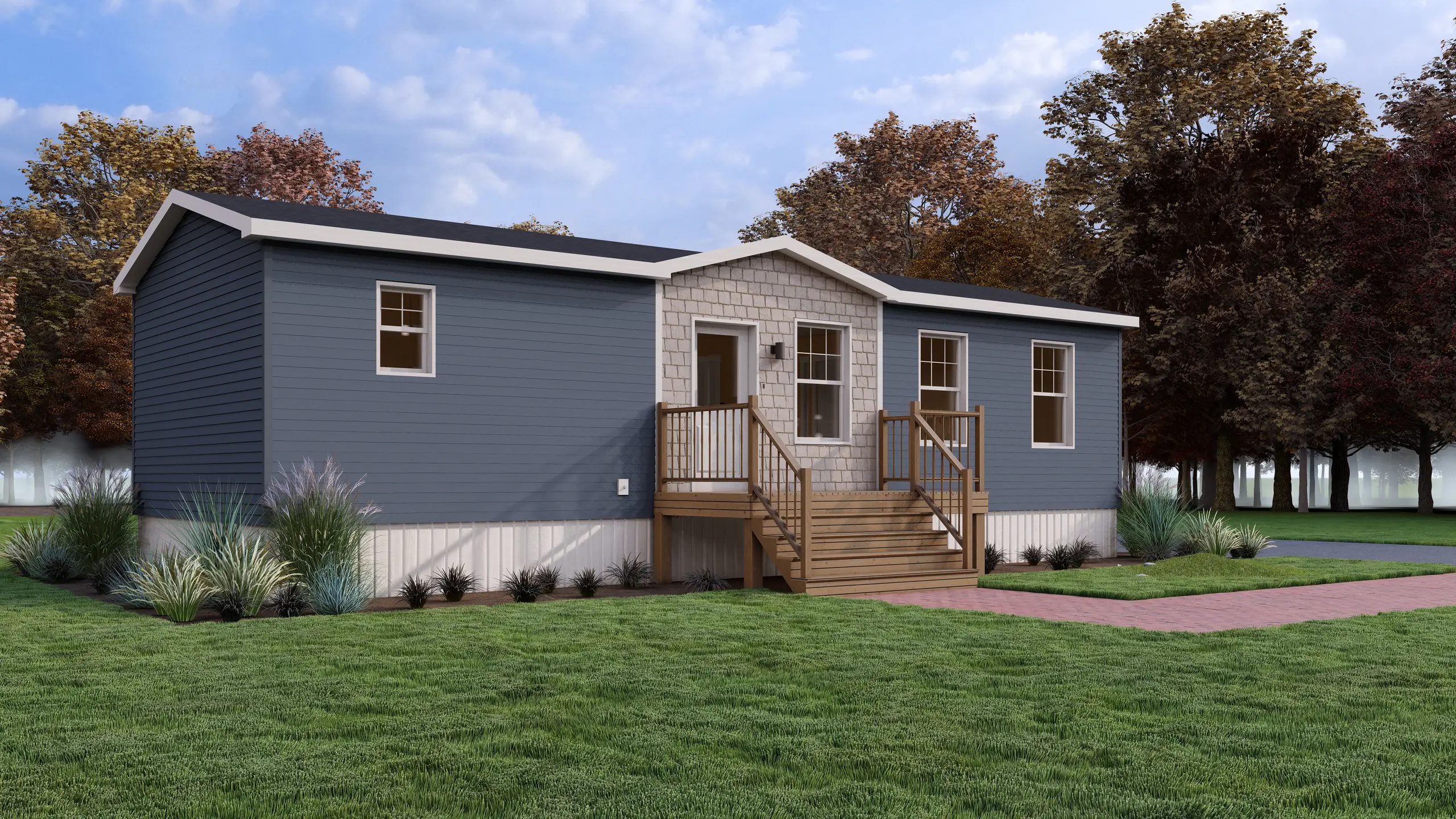 Front angled view of a contemporary mini home featuring blue siding, a central gabled entrance, wood front steps, and landscaped garden beds. 
