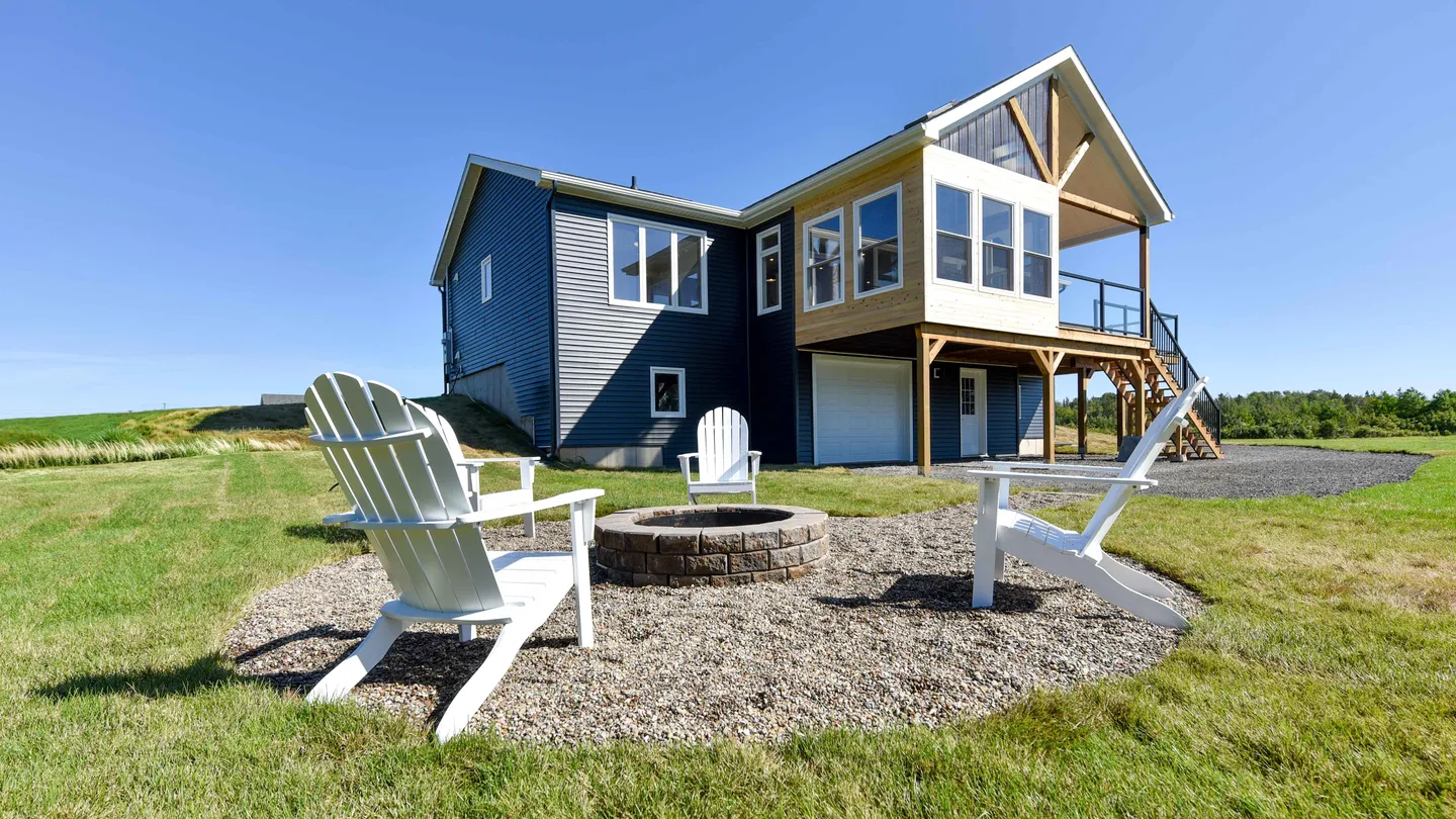 kent-homes-cottage-exterior-fire-pit-raised-deck.jpg
