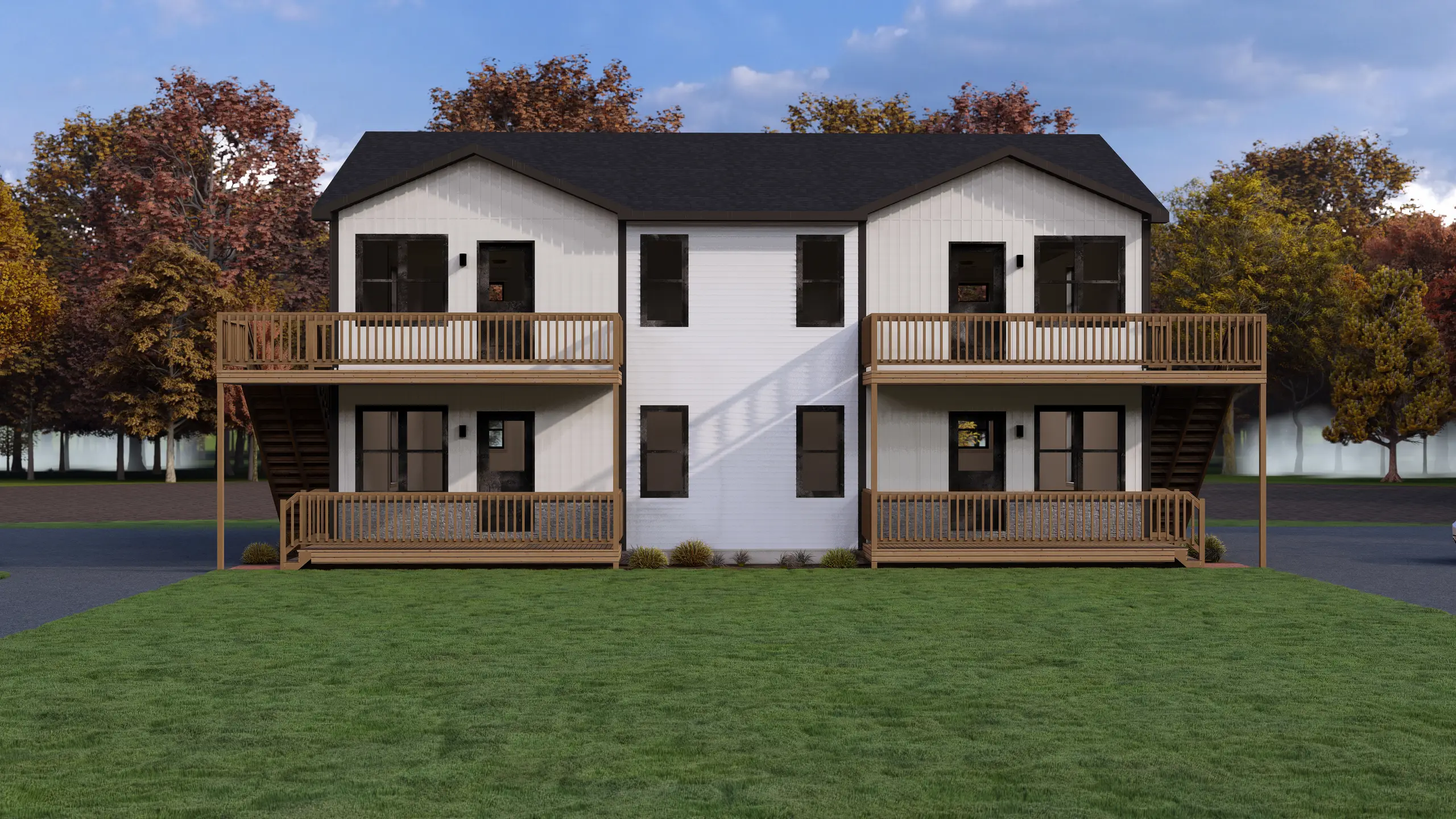 Contemporary four-unit residential building featuring upper and lower private balconies, individual unit entrances, and a symmetrical exterior design. 
