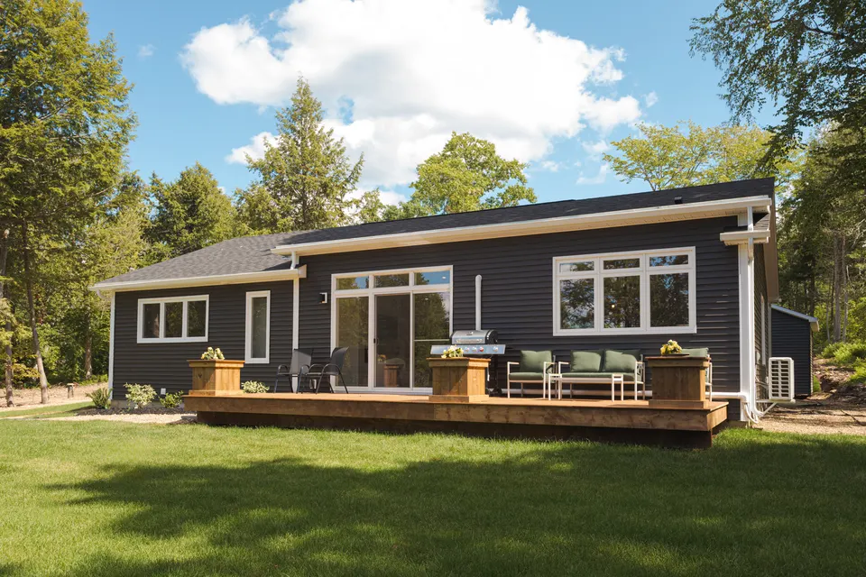 kent-homes-nb-cottage-rear-exterior-deck-yard.jpg