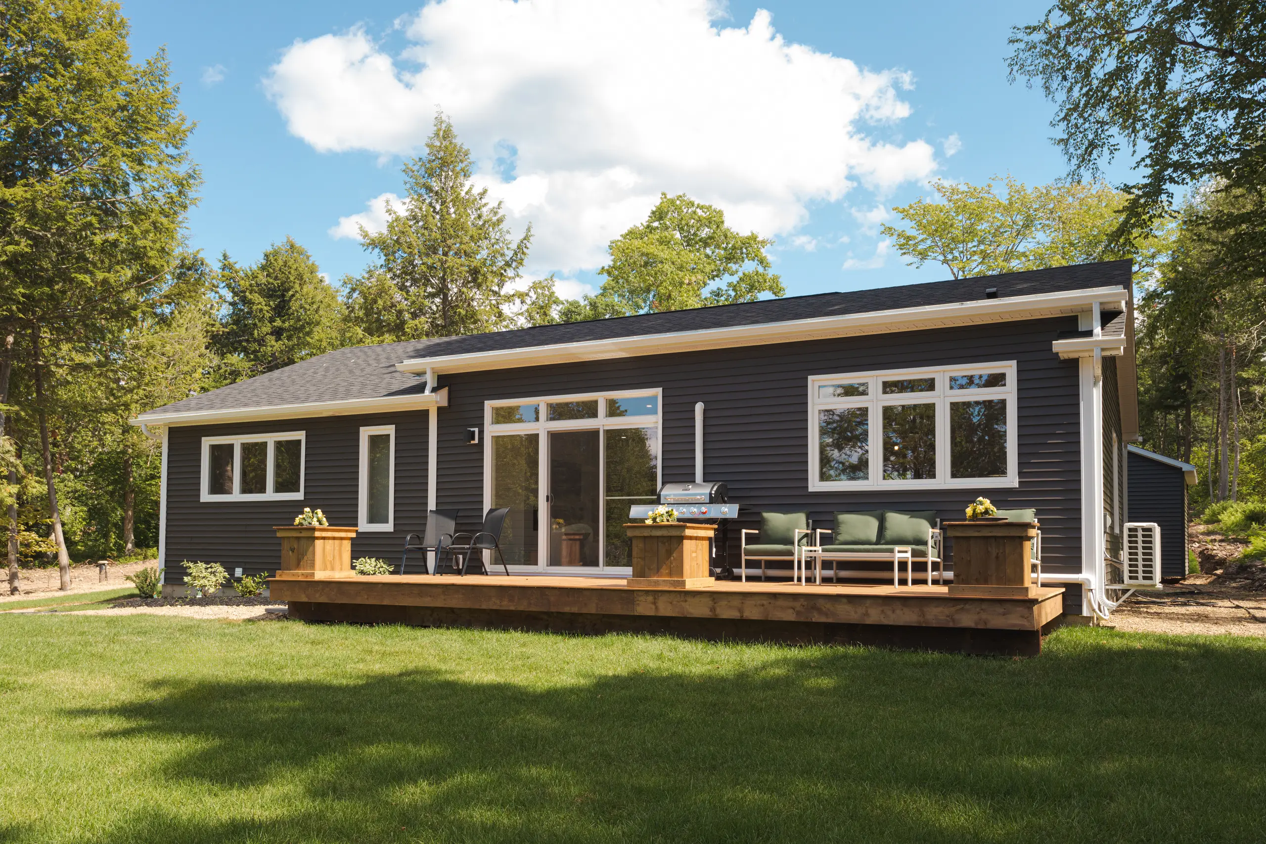 kent-homes-nb-cottage-rear-exterior-deck-yard.jpg