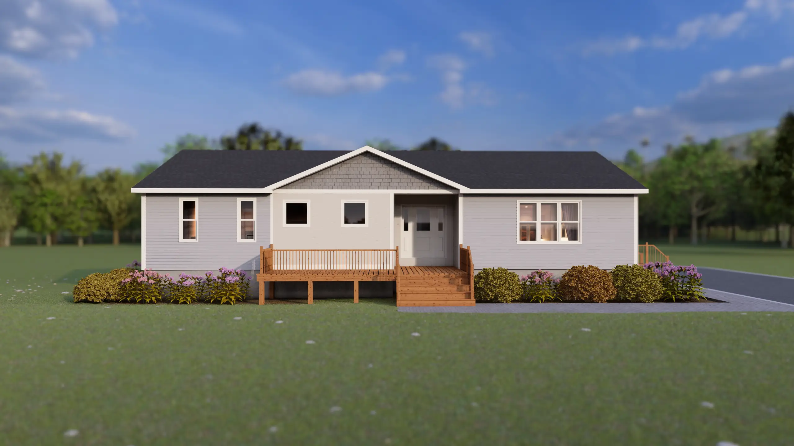 Modern bungalow with light grey siding, a welcoming front porch, and landscaped shrubs and flowers framing the entrance. 