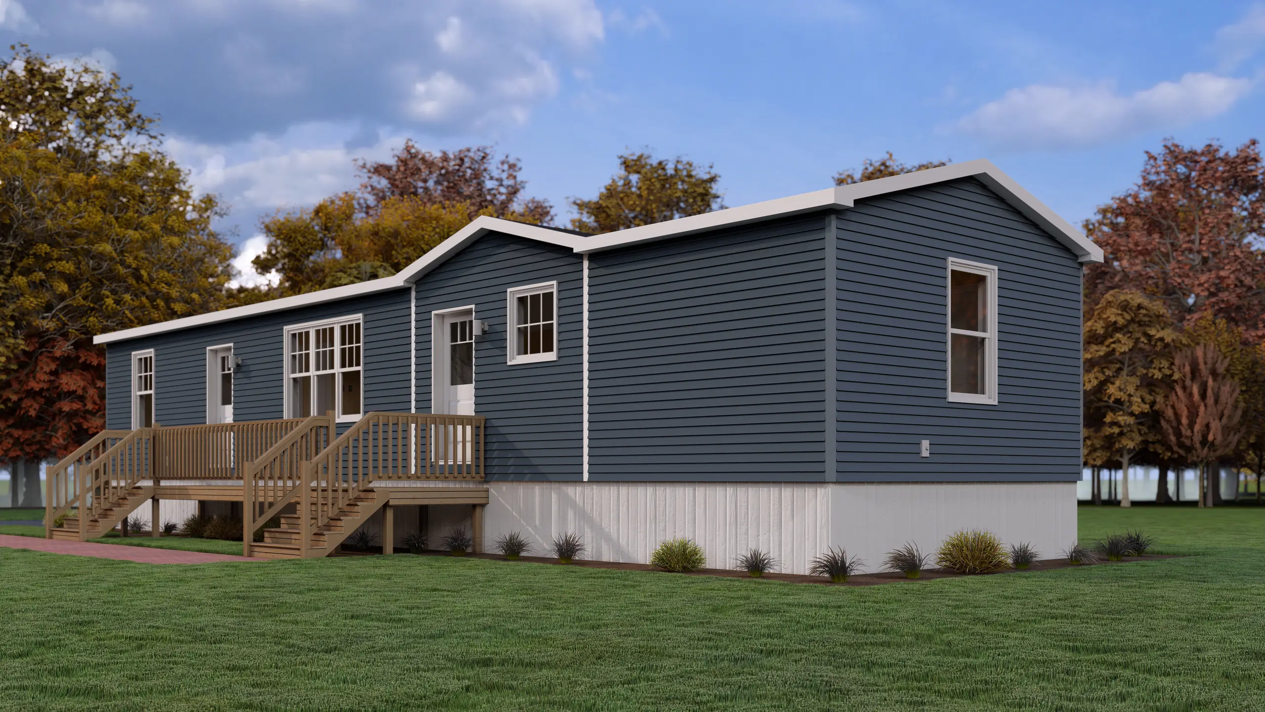 Rear angled view of a blue modular home showcasing dual front entries, a spacious raised deck, white trim accents, and clean architectural lines. 