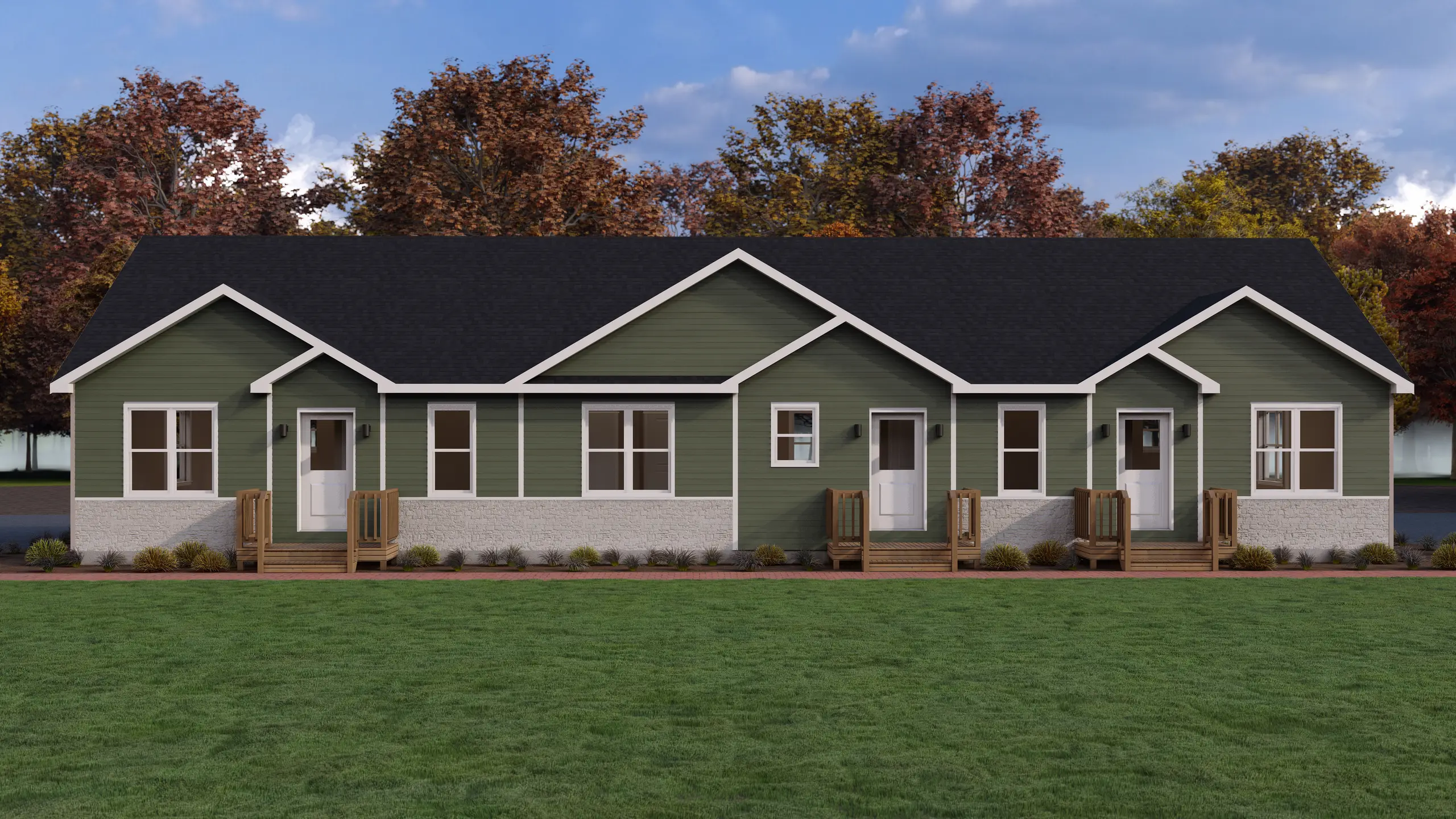 Contemporary multi-unit residential building with green siding, stone skirting, private front entrances, and individual covered porches. 