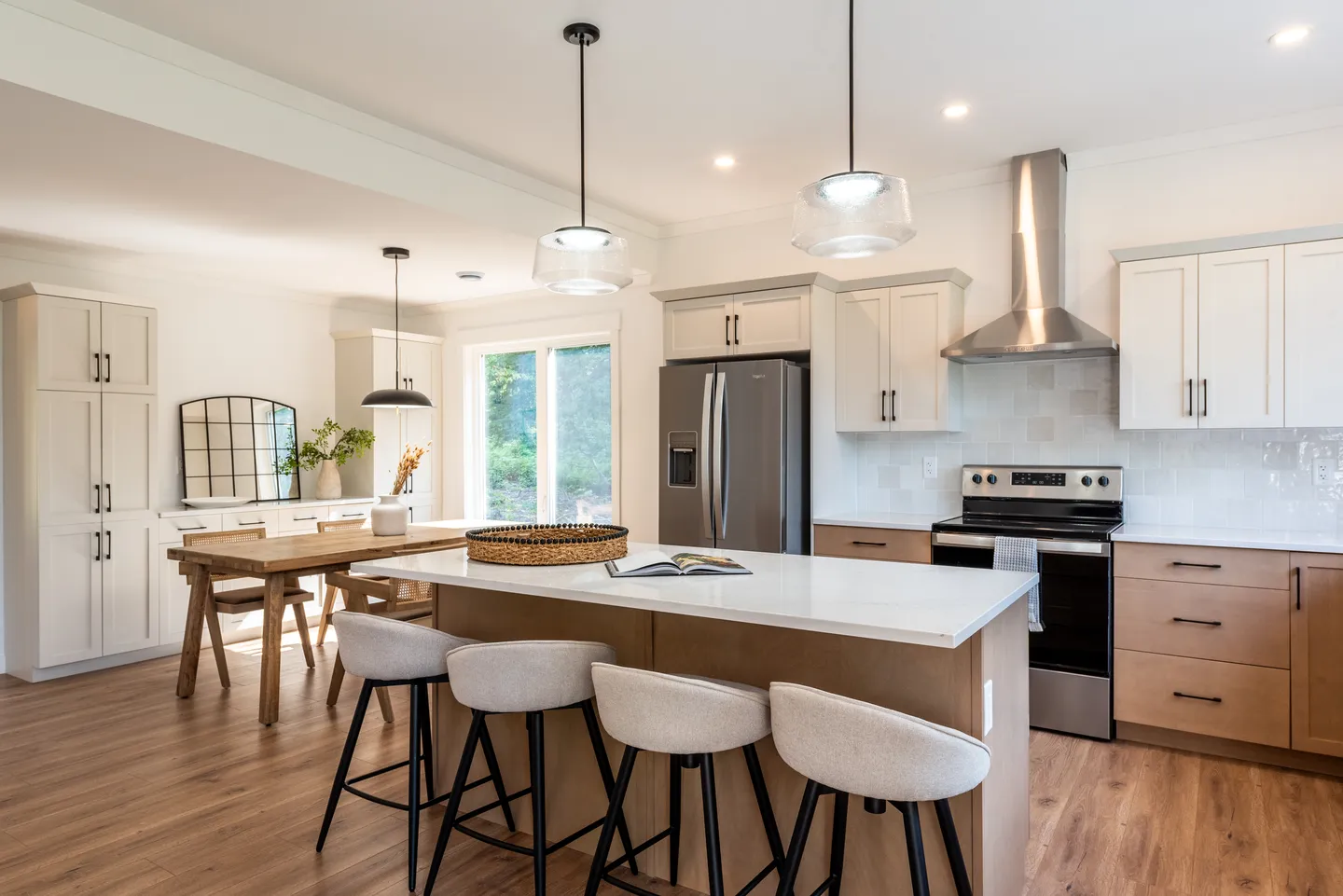 kent-homes-open-concept-kitchen-island-wood-accents.jpg