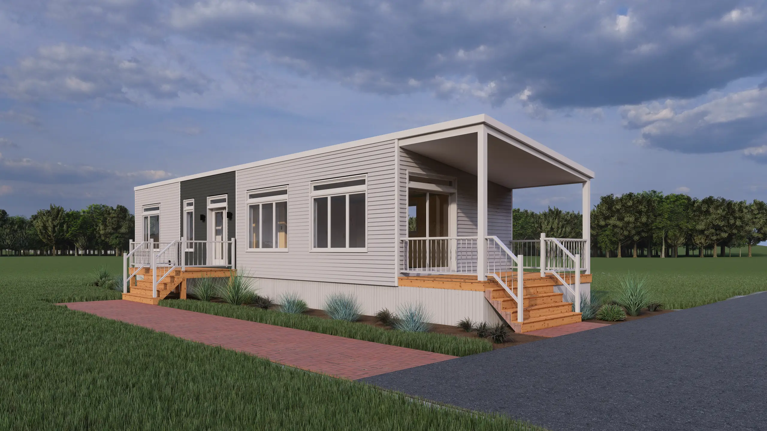Modern modular home with expansive windows, dual covered porches, wood staircases, white railings, landscaped garden beds, and a brick walkway leading to the main entrance, surrounded by open green space.
