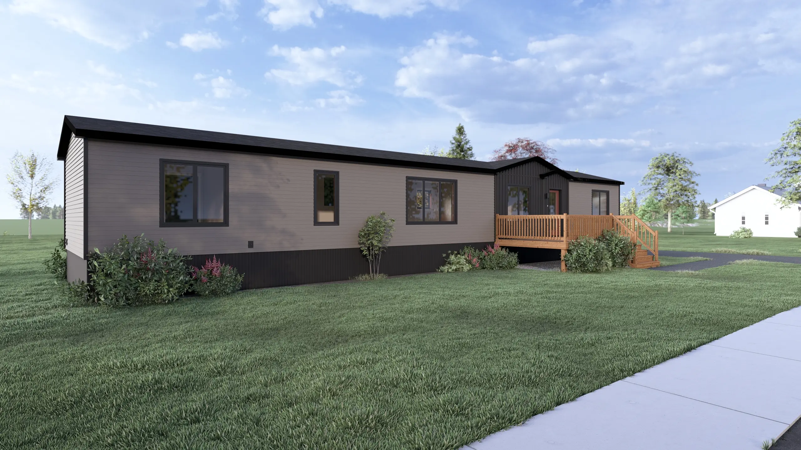 Side view of a modern mini home with light grey horizontal siding, large windows, rear deck access, and low-maintenance landscaping. 