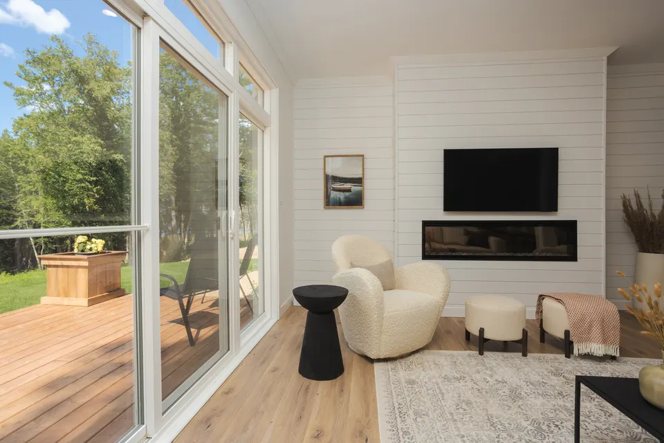 kent-homes-nb-cottage-living-room-fireplace-deck.jpg